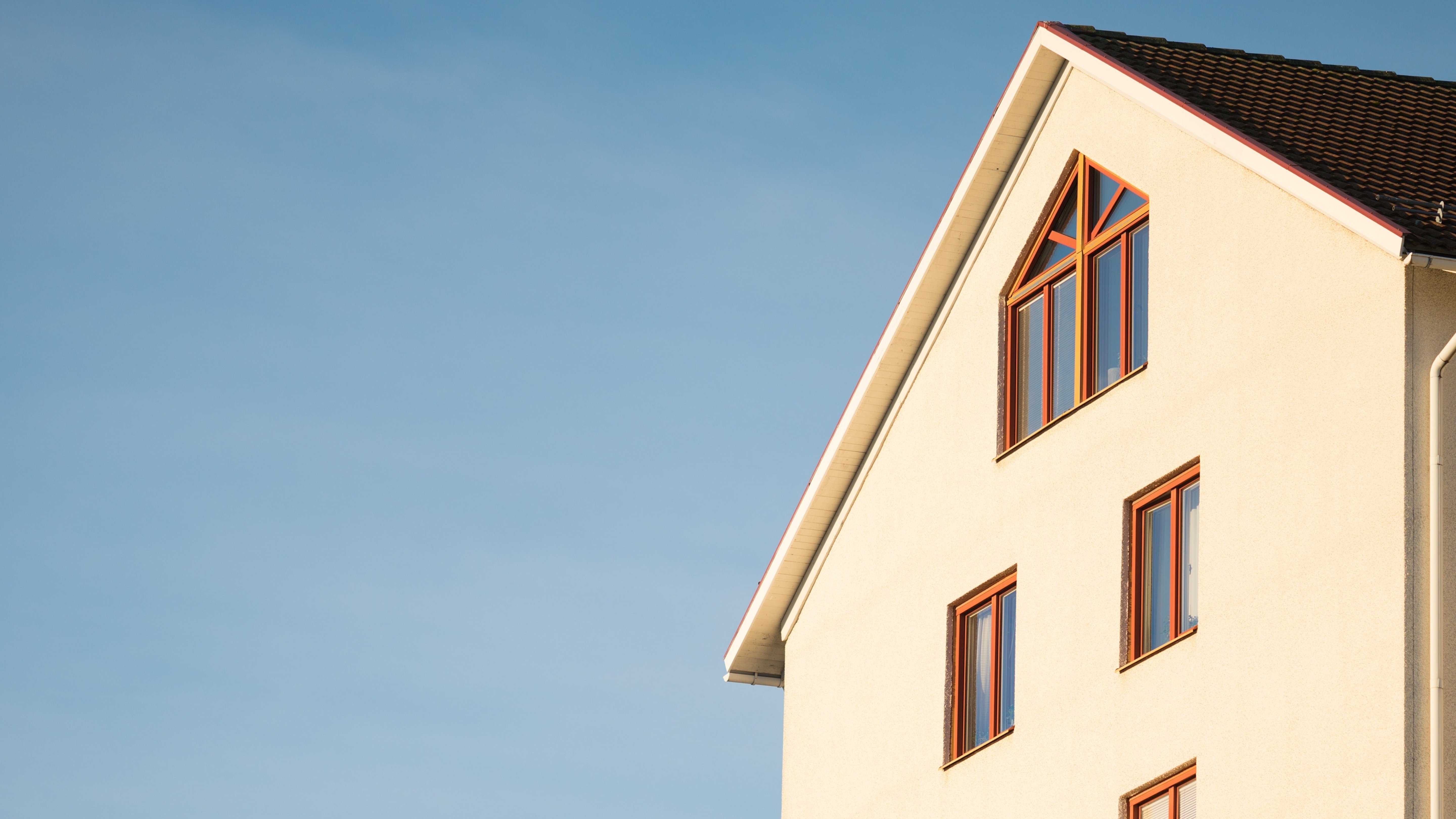 Image of a pitched roof of a home in North Carolina to signify high mortgage interest rates